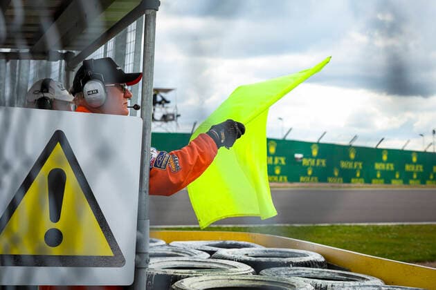 Marshal waves yellow flag, F1 Grand Prix of Great Britain at Silverstone Circuit on July 3, 2022 in Silverstone, United Kingdom. (Photo by HOCH ZWEI) Silverstone United Kingdom