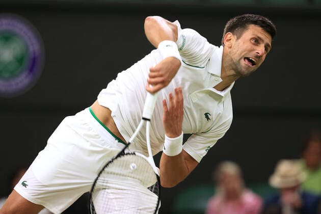 Tennis - Wimbledon (Day 7) 3rd July 2022 - Tennis - Wimbledon (Day 7) - Gentlemen s Singles Round of 16 match - Novak Djokovic (SRB) v Tim Van Rijthoven (NED) - Djokovic serves. Photo: Simon Stacpoole Offside. London UK Copyright: xSimonxStacpoolexOffside