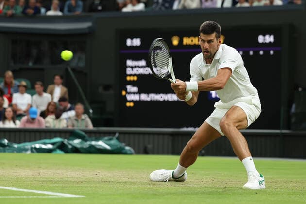 3rd July 2022, All England Lawn Tennis and Croquet Club, London, England; Wimbledon Tennis tournament; Novak Djokovic plays a backhand to Tim van Rijthoven in the mens singles  ActionPlus12405030 ShaunxBrooks