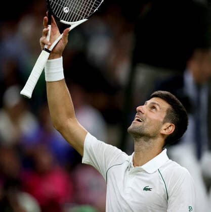 (220704) -- LONDON, July 4, 2022 -- Novak Djokovic of Serbia reacts after winning the men s singles fourth round match against Tim Van Rijthoven of the Netherland at Wimbledon tennis Championship in London, Britain, on July 3, 2022. ) (SP)BRITAIN-LONDON-TENNIS-WIMBLEDON-MEN S SINGLES LixYing 