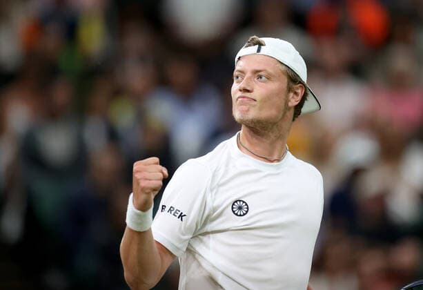 (220704) -- LONDON, July 4, 2022 -- Tim Van Rijthoven of the Netherland reacts during the men s singles fourth round match against Novak Djokovic of Serbia at Wimbledon tennis Championship in London, Britain, on July 3, 2022. ) (SP)BRITAIN-LONDON-TENNIS-WIMBLEDON-MEN S SINGLES LixYing 