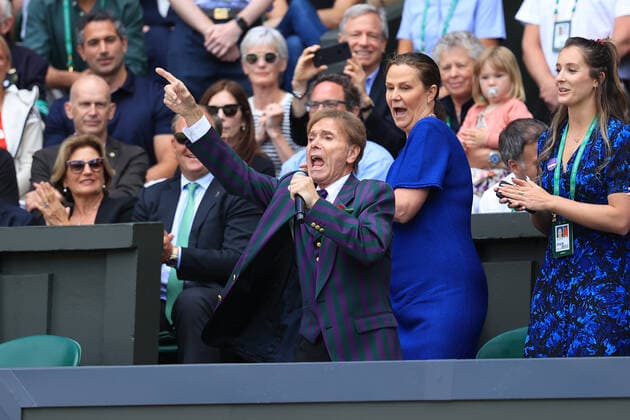 Tennis - Wimbledon (Day 7) 3rd July 2022 - Tennis - Wimbledon (Day 7) - Sir Cliff Richard performs from the audience on Centre Court - Photo: Simon Stacpoole Offside. London UK Copyright: xSimonxStacpoolexOffside
