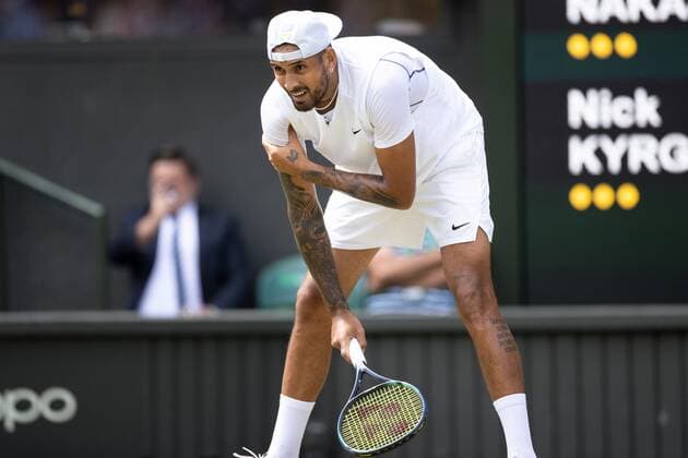 Mandatory Credit: Photo by Ella Ling Shutterstock (13012858k) Nick Kyrgios injures his arm during his fourth round match Wimbledon Tennis Championships, Day 8, The All England Lawn Tennis and Croquet Club, London, UK - 04 Jul 2022 Wimbledon Tennis Championships, Day 8, The All England Lawn Tennis and Croquet Club, London, UK - 04 Jul 2022  Copyright: xEllaxLing Shutterstockx 13012858k