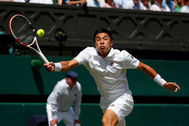 4th July 2022, All England Lawn Tennis and Croquet Club, London, England; Wimbledon Tennis tournament; Brandon Nakashima (USA) plays a backhand to Nick Kyrgios (AUS)  ActionPlus12405070 JohnxPatrickxFletcher