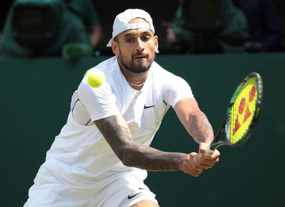 Australian Nick Kyrgios in action in his fourth round match against American Brandon Nakashima on day eight of the 2022 Wimbledon championships in London on Monday, July 04, 2022.  LON2022070418 HUGOxPHILPOTT