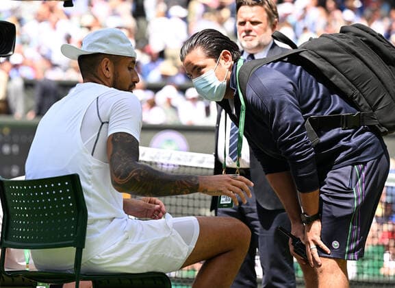 Tennis Championships - Week One - Day Eight - All England Lawn Tennis Club, Wimbledon - Monday 4th July 2022 Brandon Nakashima (USA) v Nick Kyrgios (AUS) Nick Kyrgios calls the trainer for his injured shoulder 