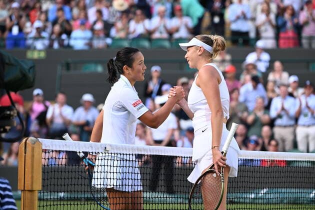 Tennis Championships - Week One - Day Eight - All England Lawn Tennis Club, Wimbledon - Monday 4th July 2022 Amanda Anisimova (USA) v Harmony Tan (FRA) Harmony Tan congratulates Amanda Anisimova at the net 