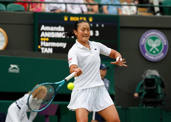 4th July 2022, All England Lawn Tennis and Croquet Club, London, England; Wimbledon Tennis tournament; Harmony Tan (FRA) plays a forehand to Amanda Anisimova (USA)  ActionPlus12405173 JohnxPatrickxFletcher