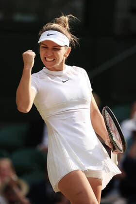 Tennis - Wimbledon (Day 7) 3rd July 2022 - Tennis - Wimbledon (Day 7) - Simona Halep (ROU) celebrates victory over Paula Badosa (ESP) in their Ladies Singles Round of 16 Round match - Photo: Simon Stacpoole Offside. London UK Copyright: xSimonxStacpoolexOffside