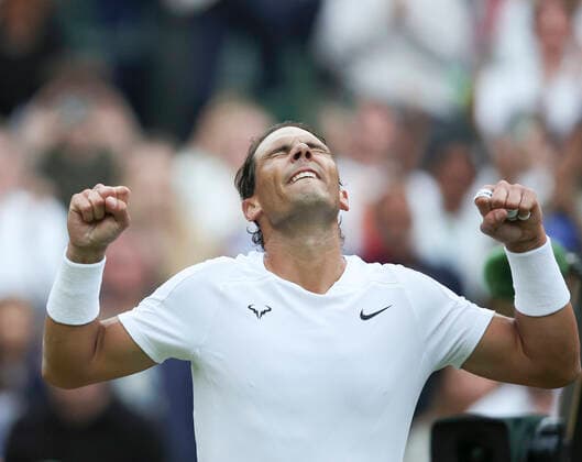 (220705) -- LONDON, July 5, 2022 -- Rafael Nadal celebrates after winning the men s singles fourth round match between Rafael Nadal of Spain and Botic van de Zandschulp of the Netherlands at Wimbledon Tennis Championship in London, Britain, on July 4, 2022. ) (SP)BRITAIN-LONDON-TENNIS-WIMBLEDON-MEN S SINGLES HanxYan 