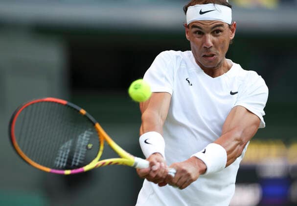 (220705) -- LONDON, July 5, 2022 -- Rafael Nadal competes during the men s singles fourth round match between Rafael Nadal of Spain and Botic van de Zandschulp of the Netherlands at Wimbledon Tennis Championship in London, Britain, on July 4, 2022. ) (SP)BRITAIN-LONDON-TENNIS-WIMBLEDON-MEN S SINGLES HanxYan 