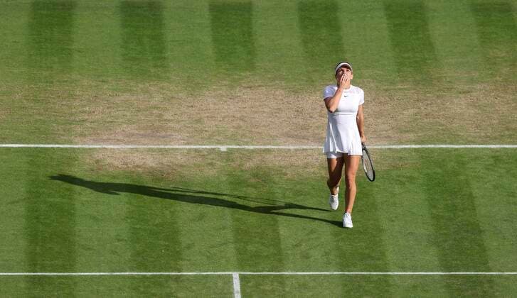 (220705) -- LONDON, July 5, 2022 -- Simona Halep of Romania celebrates after the women s singles fourth round match against Paula Badosa of Spain at Wimbledon Tennis Championship in London, Britain, on July 4, 2022. ) (SP)BRITAIN-LONDON-TENNIS-WIMBLEDON-WOMEN S SINGLES HanxYan 
