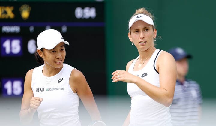 (220705) -- LONDON, July 5, 2022 -- Zhang Shuai (L) of China Elise Mertens of Belgium react during the women s doubles third round match between Zhang Shuai of China Elise Mertens of Belgium and Nadiia Kichenok of Ukraine Raluca Olaru of Romania at Wimbledon Tennis Championship in London, Britain, on July 4, 2022. ) (SP)BRITAIN-LONDON-TENNIS-WIMBLEDON-WOMEN S DOUBLES LixYing 