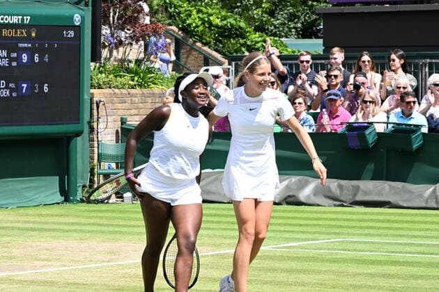 Tennis Championships - Week One - Day Eight - All England Lawn Tennis Club, Wimbledon - Tuesday 5th July 2022 Invitation Girls Doubles. Hannah Klugman and Hephzibah Oluwadare v Weronika Ewald and Isis Louise den Broek Hannah Klugman and Hephzibah Oluwadare of Great Britain celebrate winning the match 