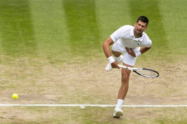 Mandatory Credit: Photo by Ella Ling Shutterstock (13012864h) Novak Djokovic during his quarter final match Wimbledon Tennis Championships, Day 9, The All England Lawn Tennis and Croquet Club, London, UK - 05 Jul 2022 Wimbledon Tennis Championships, Day 9, The All England Lawn Tennis and Croquet Club, London, UK - 05 Jul 2022  Copyright: xEllaxLing Shutterstockx 13012864h