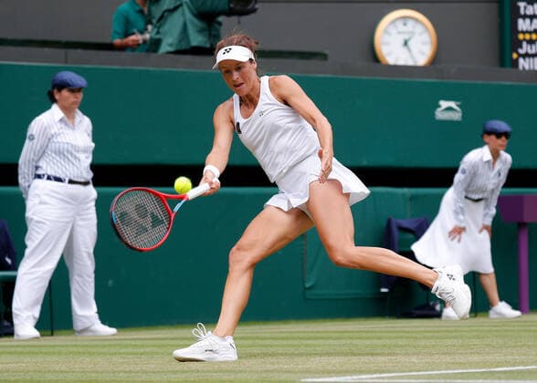 5th July 2022, All England Lawn Tennis and Croquet Club, London, England; Wimbledon Tennis tournament; Tatjana Maria (GER) plays a forehand to Jule Niemeier (GER)  ActionPlus12405231 JohnxPatrickxFletcher