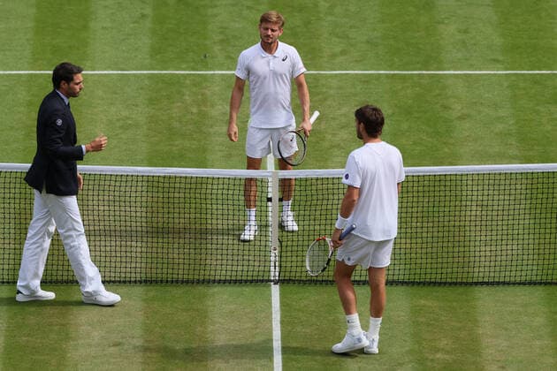 Belgian David Goffin and UK Cameron Norrie pictured before the start of their tennis match in the 1 8 finals of the men s singles tournament at the 2022 Wimbledon grand slam tennis tournament at the All England Tennis Club, in south-west London, Britain, Tuesday 05 July 2022. BENOITxDOPPAGNE  x37031949x