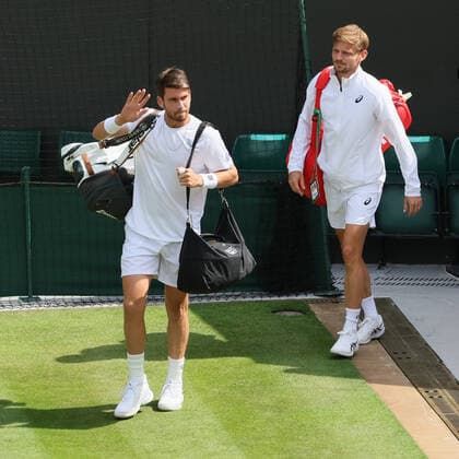 Belgian David Goffin and UK Cameron Norrie pictured before the start of their tennis match in the 1 8 finals of the men s singles tournament at the 2022 Wimbledon grand slam tennis tournament at the All England Tennis Club, in south-west London, Britain, Tuesday 05 July 2022. BENOITxDOPPAGNE  x37031956x