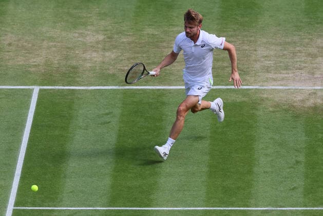 Belgian David Goffin pictured in action during a tennis match against UK Norrie in the 1 8 finals of the men s singles tournament at the 2022 Wimbledon grand slam tennis tournament at the All England Tennis Club, in south-west London, Britain, Tuesday 05 July 2022. BENOITxDOPPAGNE  x37033395x