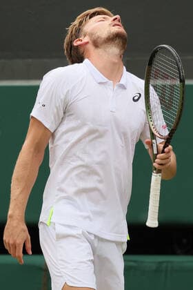 Belgian David Goffin reacts during a tennis match against UK Norrie in the 1 8 finals of the men s singles tournament at the 2022 Wimbledon grand slam tennis tournament at the All England Tennis Club, in south-west London, Britain, Tuesday 05 July 2022. BENOITxDOPPAGNE  x37035521x