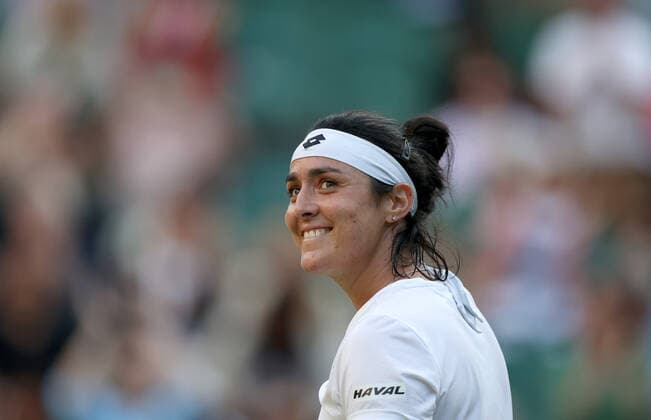 (220706) -- LONDON, July 6, 2022 -- Ons Jabeur of Tunisia reacts after the women s singles quarter-final match against Marie Bouzkova of the Czech Republic at Wimbledon Tennis Championship in London, Britain, on July 5, 2022. ) (SP)BRITAIN-LONDON-TENNIS-WIMBLEDON-WOMEN S SINGLES-QUARTERFINALS LixYing 