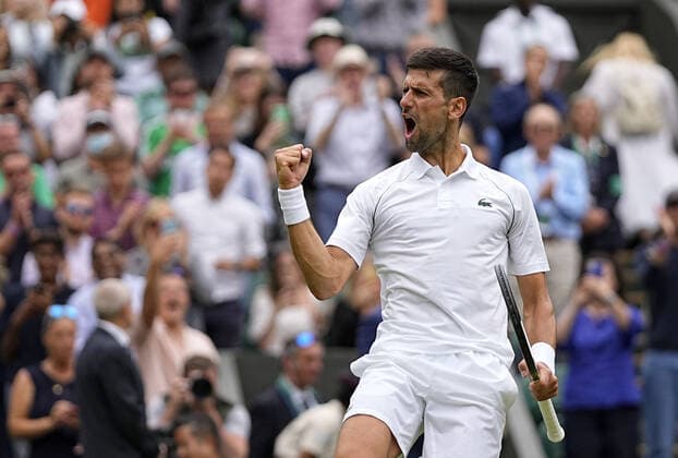 Sport Bilder des Tages Tennis: Wimbledon championships Novak Djokovic of Serbia celebrates after beating Jannik Sinner of Italy in the quarterfinals of the Wimbledon tennis tournament in London on July 5, 2022.  A14AA0001310933P