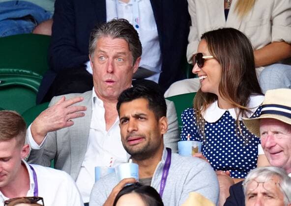 Mandatory Credit: Photo by Javier Garcia Shutterstock (13018042ch) Hugh Grant and Anna Elisabet Eberstein watching the action on Centre Court Wimbledon Tennis Championships, Day 10, The All England Lawn Tennis and Croquet Club, London, UK - 06 Jul 2022 Wimbledon Tennis Championships, Day 10, The All England Lawn Tennis and Croquet Club, London, UK - 06 Jul 2022  Copyright: xJavierxGarcia Shutterstockx 13018042ch