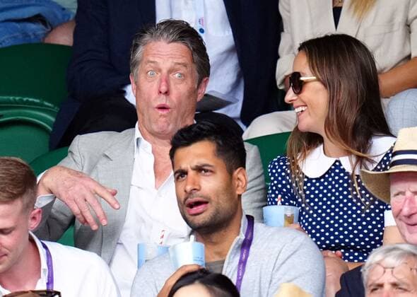 Mandatory Credit: Photo by Javier Garcia Shutterstock (13018042cc) Hugh Grant and Anna Elisabet Eberstein watching the action on Centre Court Wimbledon Tennis Championships, Day 10, The All England Lawn Tennis and Croquet Club, London, UK - 06 Jul 2022 Wimbledon Tennis Championships, Day 10, The All England Lawn Tennis and Croquet Club, London, UK - 06 Jul 2022  Copyright: xJavierxGarcia Shutterstockx 13018042cc