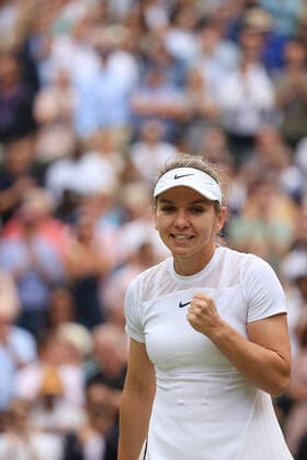Tennis - Wimbledon (Day 10) 6th July 2022 - Tennis - Wimbledon (Day 10) - Simona Halep (ROU) celebrates victory over Amanda Anisimova (USA) in their Ladies Singles Quarter Final match - Photo: Simon Stacpoole Offside. London UK Copyright: xSimonxStacpoolexOffside