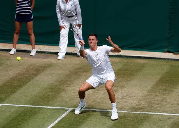 6th July 2022, All England Lawn Tennis and Croquet Club, London, England; Wimbledon Tennis tournament; Joe Salisbury (GBR) plays a forehand to Edouard Roger-Vasselin (FRA)  ActionPlus12405399 JohnxPatrickxFletcher