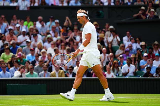 Mandatory Credit: Photo by Javier Garcia Shutterstock (13018042gy) Rafael Nadal struggles with an injury during his quarter-final match Wimbledon Tennis Championships, Day 10, The All England Lawn Tennis and Croquet Club, London, UK - 06 Jul 2022 Wimbledon Tennis Championships, Day 10, The All England Lawn Tennis and Croquet Club, London, UK - 06 Jul 2022  Copyright: xJavierxGarcia Shutterstockx 13018042gy