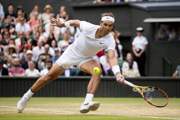 Mandatory Credit: Photo by Ella Ling Shutterstock (13018040ci) Rafael Nadal during his quarter final match Wimbledon Tennis Championships, Day 10, The All England Lawn Tennis and Croquet Club, London, UK - 06 Jul 2022 Wimbledon Tennis Championships, Day 10, The All England Lawn Tennis and Croquet Club, London, UK - 06 Jul 2022  Copyright: xEllaxLing Shutterstockx 13018040ci