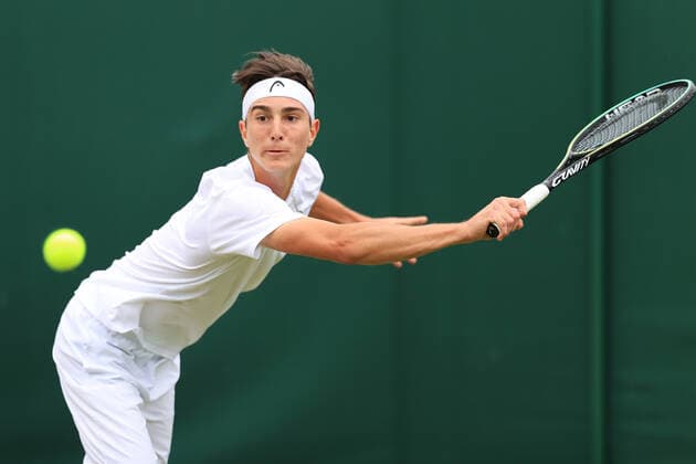 Tennis - Wimbledon (Day 11) 7th July 2022 - Tennis - Wimbledon (Day 11) - Kilian Feldbausch (SUI) in action against Mili Poljicak (CRO) in their Boys Singles Qarter Finals match - Photo: Simon Stacpoole Offside. London UK Copyright: xSimonxStacpoolexOffside