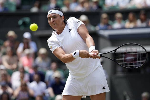 Mandatory Credit: Photo by Dave Shopland Shutterstock (13018044g) Ons Jabeur during her semi final match Wimbledon Tennis Championships, Day 11, The All England Lawn Tennis and Croquet Club, London, UK - 07 Jul 2022 Wimbledon Tennis Championships, Day 11, The All England Lawn Tennis and Croquet Club, London, UK - 07 Jul 2022  Copyright: xDavexShopland Shutterstockx 13018044g