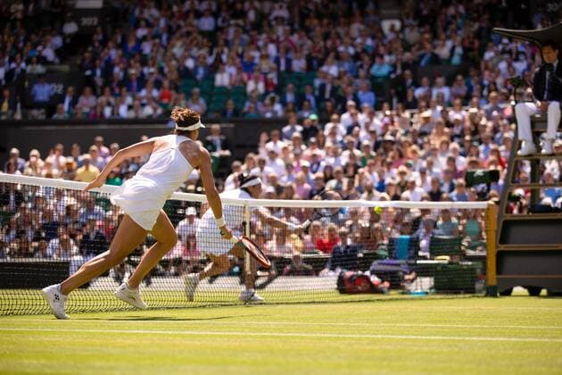 Mandatory Credit: Photo by Ella Ling Shutterstock (13018045r) Ons Jabeur and Tatjana Maria during their semi final match Wimbledon Tennis Championships, Day 11, The All England Lawn Tennis and Croquet Club, London, UK - 07 Jul 2022 Wimbledon Tennis Championships, Day 11, The All England Lawn Tennis and Croquet Club, London, UK - 07 Jul 2022  Copyright: xEllaxLing Shutterstockx 13018045r