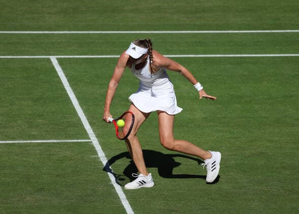 7th July 2022, All England Lawn Tennis and Croquet Club, London, England; Wimbledon Tennis tournament; Elena Rybakina (KAZ) plays a backhand to Simona Halep (ROU) in their womens singles semi-final match  ActionPlus12405710 JohnxPatrickxFletcher