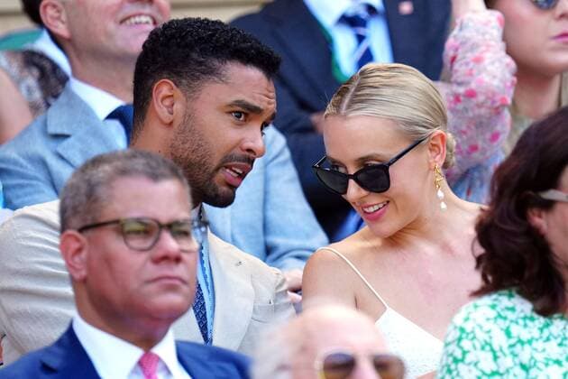 Mandatory Credit: Photo by Javier Garcia Shutterstock (13018051g) Rege-Jean Page and Emily Brown in the Royal Box on Centre Court Wimbledon Tennis Championships, Day 12, The All England Lawn Tennis and Croquet Club, London, UK - 08 Jul 2022 Wimbledon Tennis Championships, Day 12, The All England Lawn Tennis and Croquet Club, London, UK - 08 Jul 2022  Copyright: xJavierxGarcia Shutterstockx 13018051g