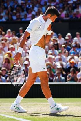 Mandatory Credit: Photo by Javier Garcia Shutterstock (13018051bw) Novak Djokovic dejected during his semi-final match Wimbledon Tennis Championships, Day 12, The All England Lawn Tennis and Croquet Club, London, UK - 08 Jul 2022 Wimbledon Tennis Championships, Day 12, The All England Lawn Tennis and Croquet Club, London, UK - 08 Jul 2022  Copyright: xJavierxGarcia Shutterstockx 13018051bw