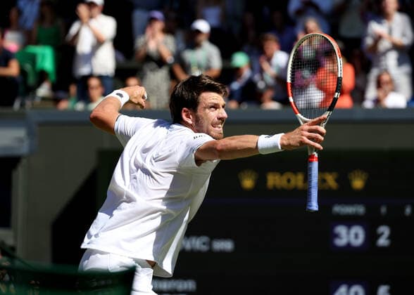 8th July 2022, All England Lawn Tennis and Croquet Club, London, England; Wimbledon Tennis tournament; Cameron Norrie (GBR) celebrates towards the crowd after winning the first set 6-2 versus Novak& xa0;Djokovic (SRB) in the mens singles semi-final  ActionPlus12406006 JohnxPatrickxFletcher