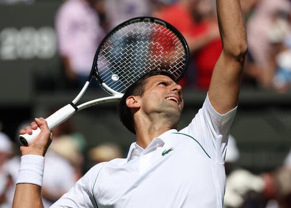 8th July 2022, All England Lawn Tennis and Croquet Club, London, England; Wimbledon Tennis tournament; Novak& xa0;Djokovic (SRB) plays a forehand to Cameron Norrie (GBR) in the mens singles semi-final  ActionPlus12406008 JohnxPatrickxFletcher