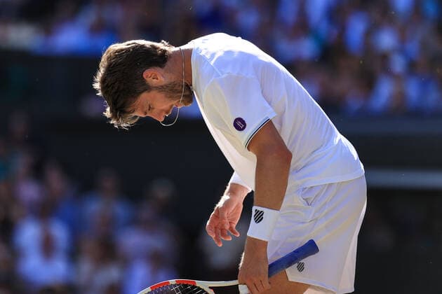 Tennis - Wimbledon (Day 12) 8th July 2022 - Tennis - Wimbledon (Day 12) - Cameron Norrie (GBR) looks dejected after his serve is broken by Novak Djokovic (SRB) during their Gentlemen s Singles Semi Final match - Photo: Simon Stacpoole Offside. London UK Copyright: xSimonxStacpoolexOffside