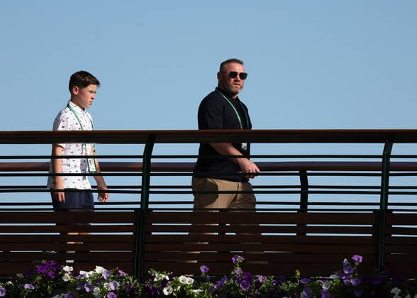 8th July 2022, All England Lawn Tennis and Croquet Club, London, England; Wimbledon Tennis tournament; Wayne Rooney with son Kai at Wimbledon in the mens singles semi-final match  ActionPlus12406089 JohnxPatrickxFletcher