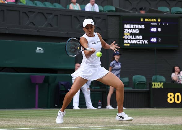 8th July 2022, All England Lawn Tennis and Croquet Club, London, England; Wimbledon Tennis tournament; Shuai Zhang (CHN) plays a forehand to Desirae Krawczyk (USA) in the womens doubles semi-final  ActionPlus12406305 JohnxPatrickxFletcher