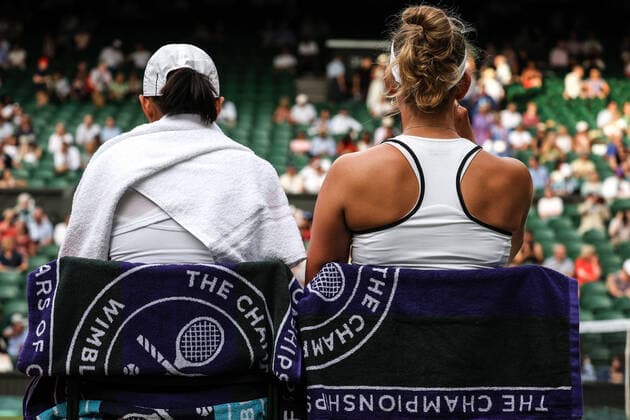 8th July 2022, All England Lawn Tennis and Croquet Club, London, England; Wimbledon Tennis tournament; Elise Mertens (BEL) with doubles partner Shuai Zhang (CHN) with Wimbledon Championship towels in the womens doubles semi-final  ActionPlus12406314 JohnxPatrickxFletcher