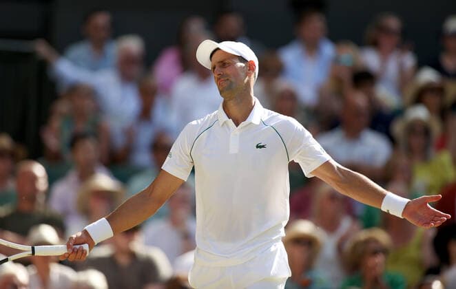 (220709) -- LONDON, July 9, 2022 -- Novak Djokovic of Serbia reacts during the men s singles semifinal match against Cameron Norrie of Great Britain at Wimbledon Tennis Championship in London, Britain, on July 8, 2022. ) (SP)BRITAIN-LONDON-TENNIS-WIMBLEDON-MEN S SINGLES-SEMIFINALS LixYing 