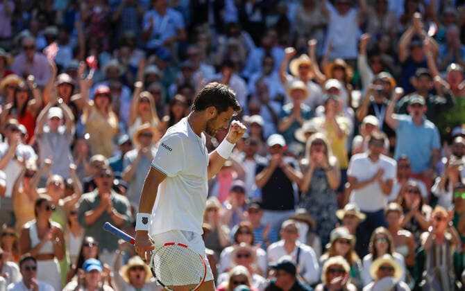 (220709) -- LONDON, July 9, 2022 -- Cameron Norrie of Great Britain celebrates during the men s singles semifinal match against Novak Djokovic of Serbia at Wimbledon Tennis Championship in London, Britain, on July 8, 2022. ) (SP)BRITAIN-LONDON-TENNIS-WIMBLEDON-MEN S SINGLES-SEMIFINALS HanxYan 