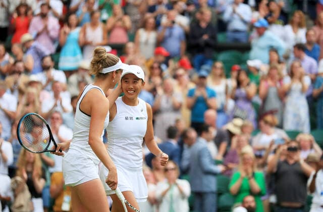 (220709) -- LONDON, July 9, 2022 -- Zhang Shuai (R) of China Elise Mertens of Belgium celebrate after winning the women s doubles semifinal match against Danielle Collins Desirae Krawczyk of the United States at Wimbledon Tennis Championship in London, Britain, on July 8, 2022. ) (SP)BRITAIN-LONDON-TENNIS-WIMBLEDON-WOMEN S DOUBLES-SEMIFINALS LixYing 