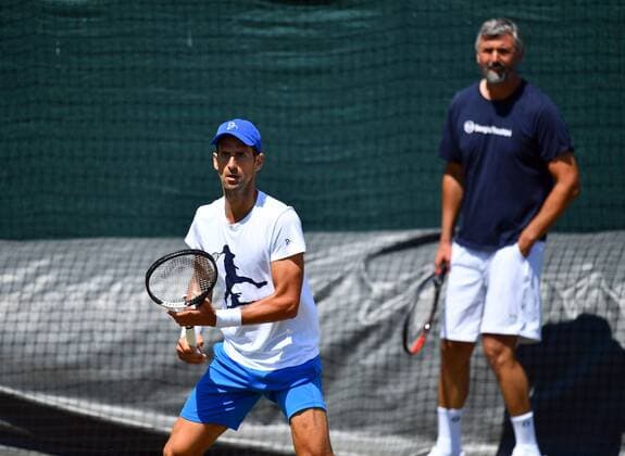 Mandatory Credit: Photo by James Veysey Shutterstock (13018056f) Novak Djokovic practicing with Goran Ivanisevic Wimbledon Tennis Championships, Day 13, The All England Lawn Tennis and Croquet Club, London, UK - 09 Jul 2022 Wimbledon Tennis Championships, Day 13, The All England Lawn Tennis and Croquet Club, London, UK - 09 Jul 2022  Copyright: xJamesxVeysey Shutterstockx 13018056f