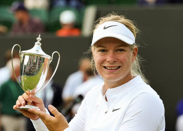 9th July 2022, All England Lawn Tennis and Croquet Club, London, England; Wimbledon Tennis tournament, ladies wheelchair singles final; Diede de Groot (NED) poses with the Ladies Wheelchair Singles Trophy  ActionPlus12406605 JohnxPatrickxFletcher