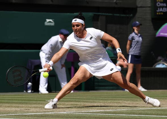 9th July 2022, All England Lawn Tennis and Croquet Club, London, England; Wimbledon Tennis tournament, womens singles final; Ons Jabeur (TUN) plays a forehand to Elena Rybakina (KAZ)  ActionPlus12406633 JohnxPatrickxFletcher
